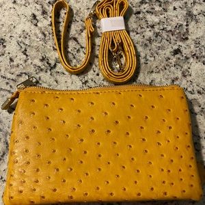 NWT embossed leather clutch